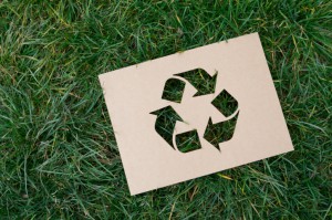 recycle sign on grass; tips for recycling content